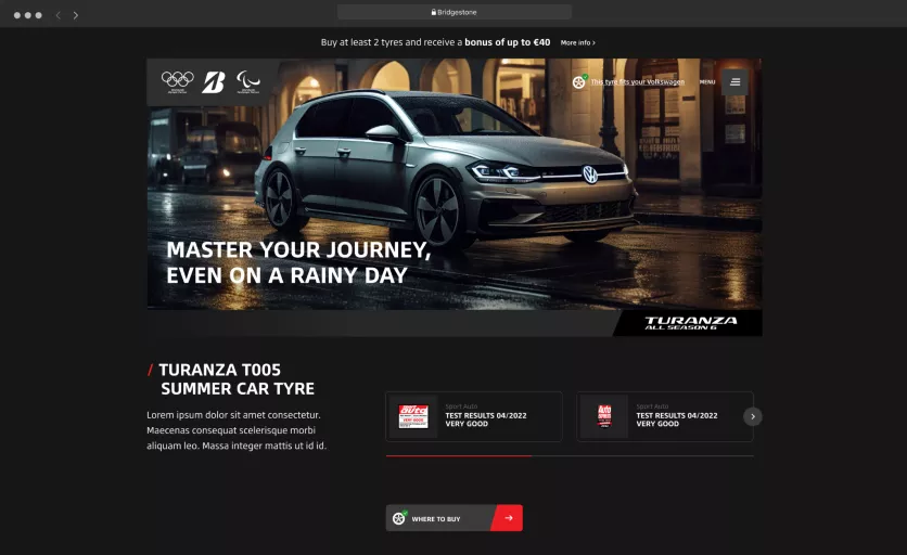 A screenshot of the DXP website design to showcase a Bridgestone Turanza T005 ad with a sleek grey Volkswagen on a rainy street under warm lights. The headline reads "Master Your Journey, Even on a Rainy Day.".